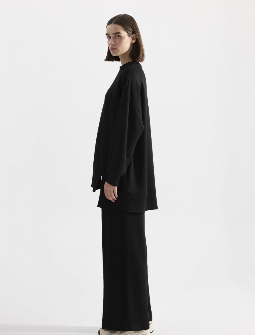 KADRİYE BAŞTÜRK  MODAL ÖRME ASİMETRİK KESİM SWEATSHIRT - SİYAH